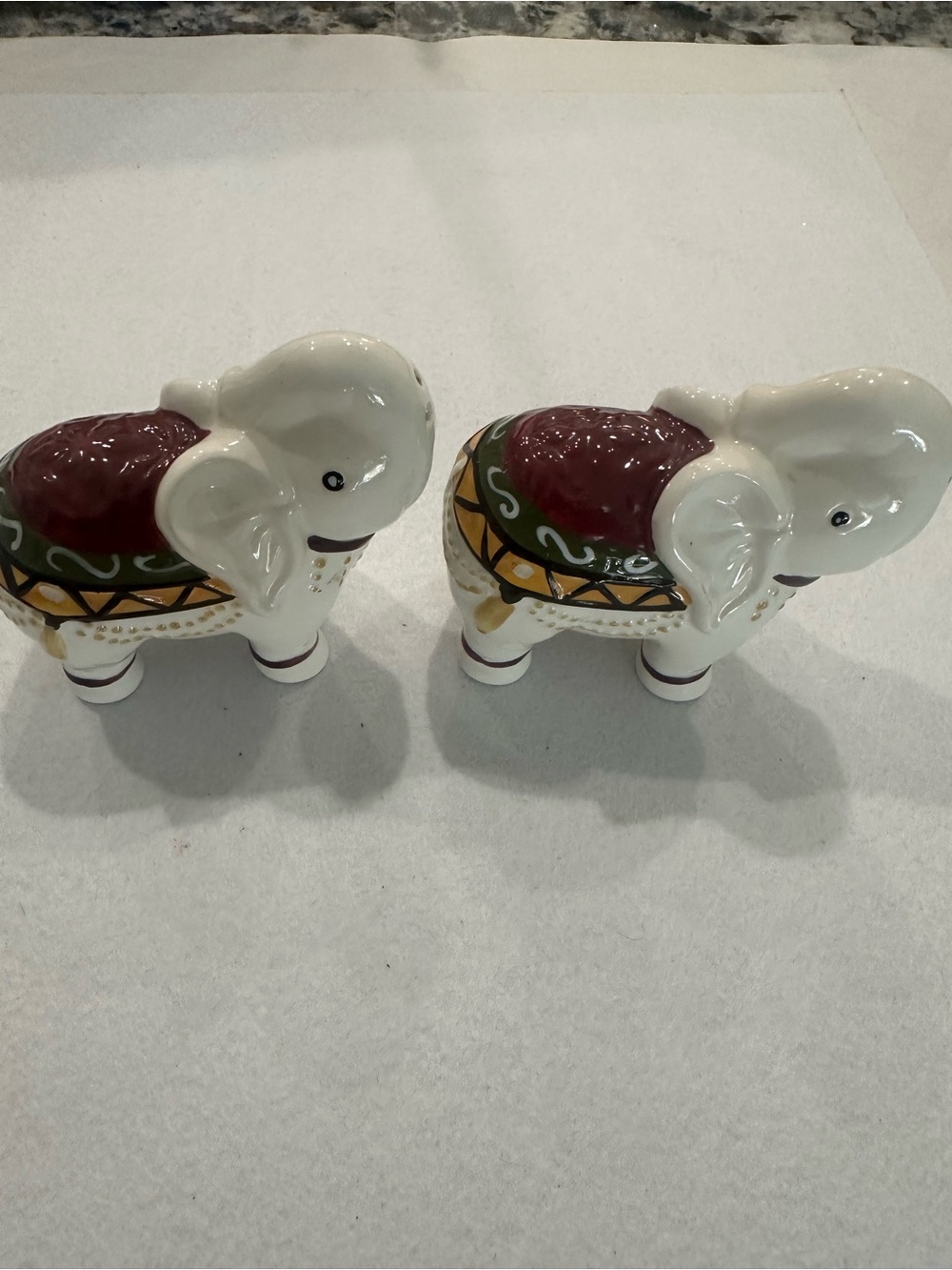 Decorative White Ceramic Elephant salt and pepper set with Burgundy Saddle -